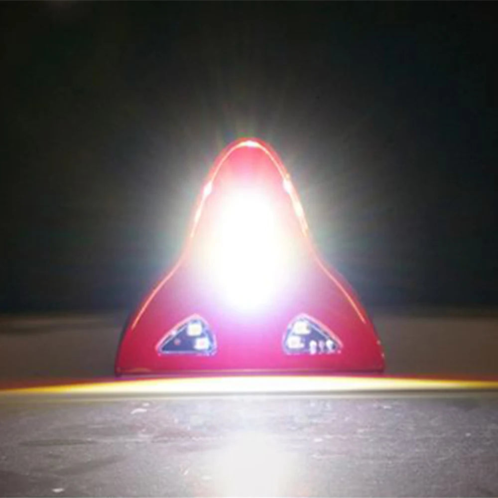 LED shark fin antenna mounted on black car