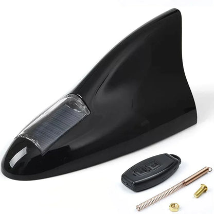 LED shark fin antenna mounted on black car black