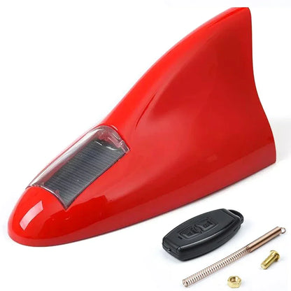 LED shark fin antenna mounted on black car red