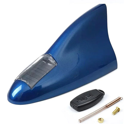 LED shark fin antenna mounted on black car