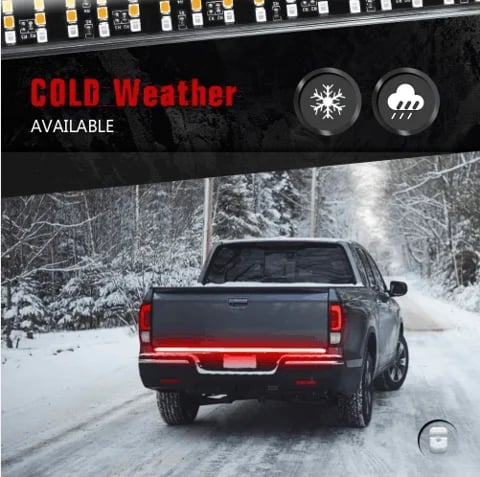 Truck driving safely in snow with SecureLite LED tailgate light bar – winter safety upgrade
